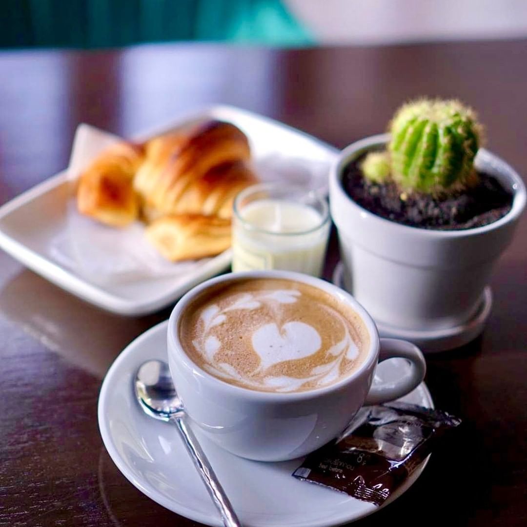 Croissant and coffee at MonAmi bakery in Koh Samui
