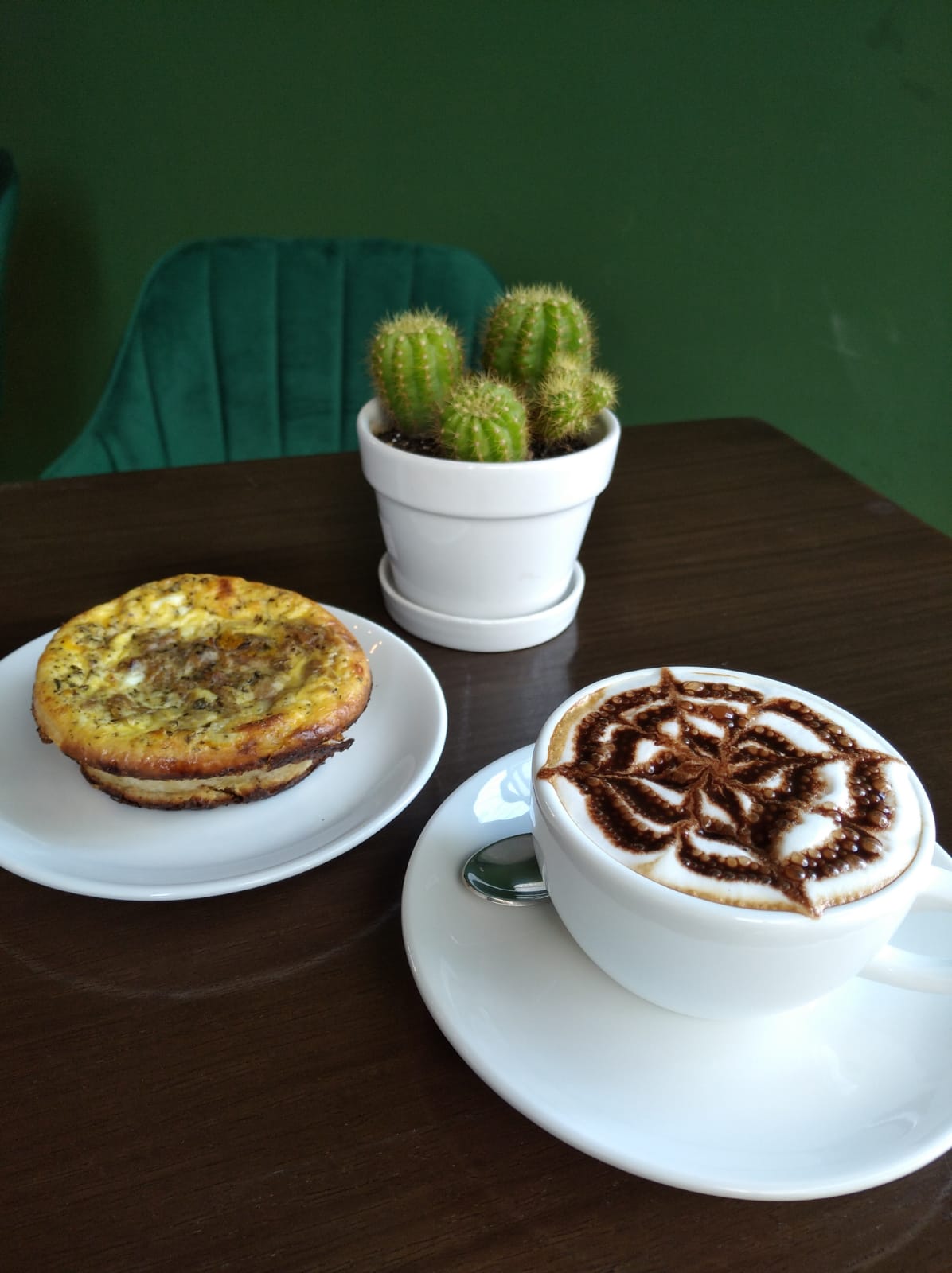 Mocha with latte art and quiche at MonAmi Café
