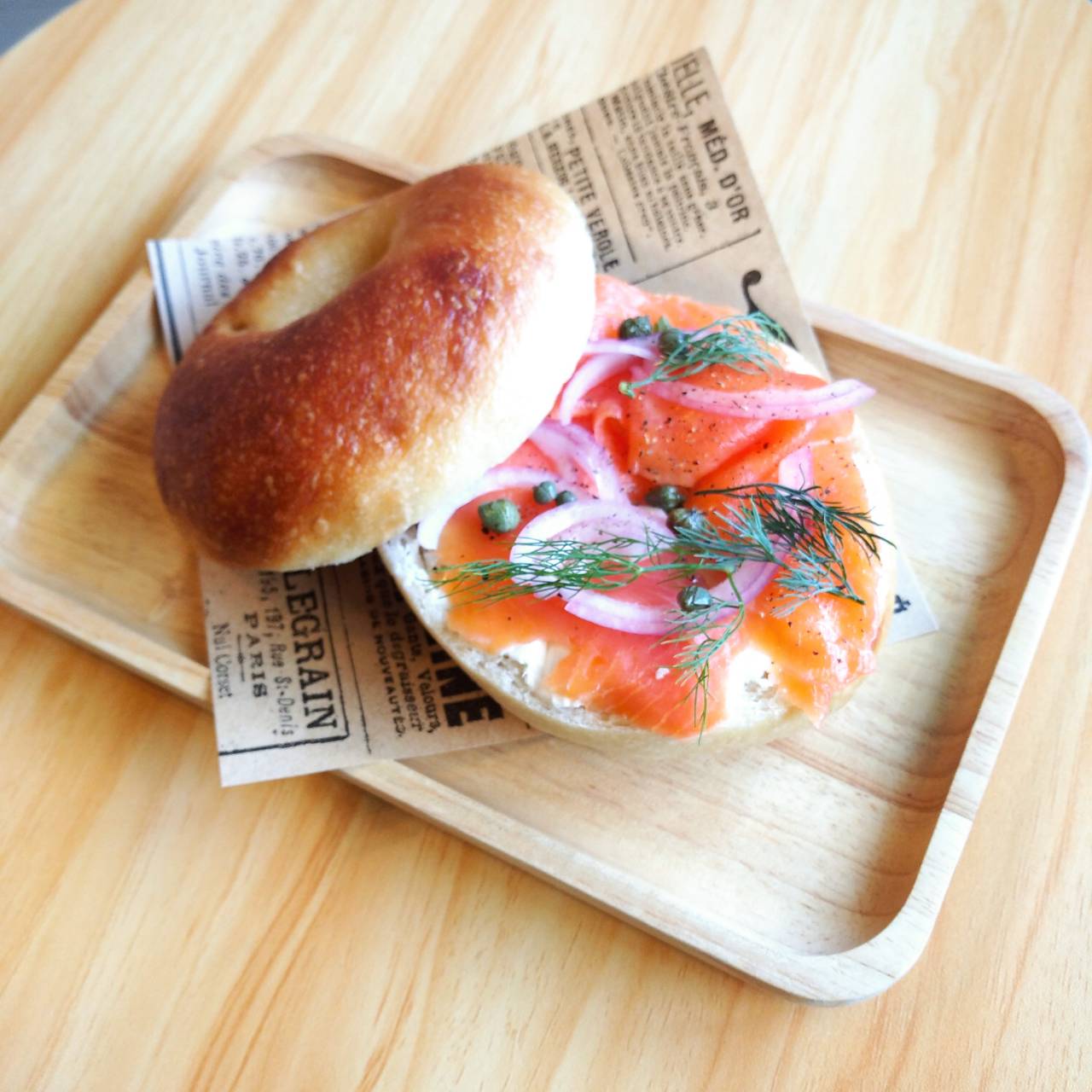 Smoked salmon bagel with capers and dill at MonAmi Café